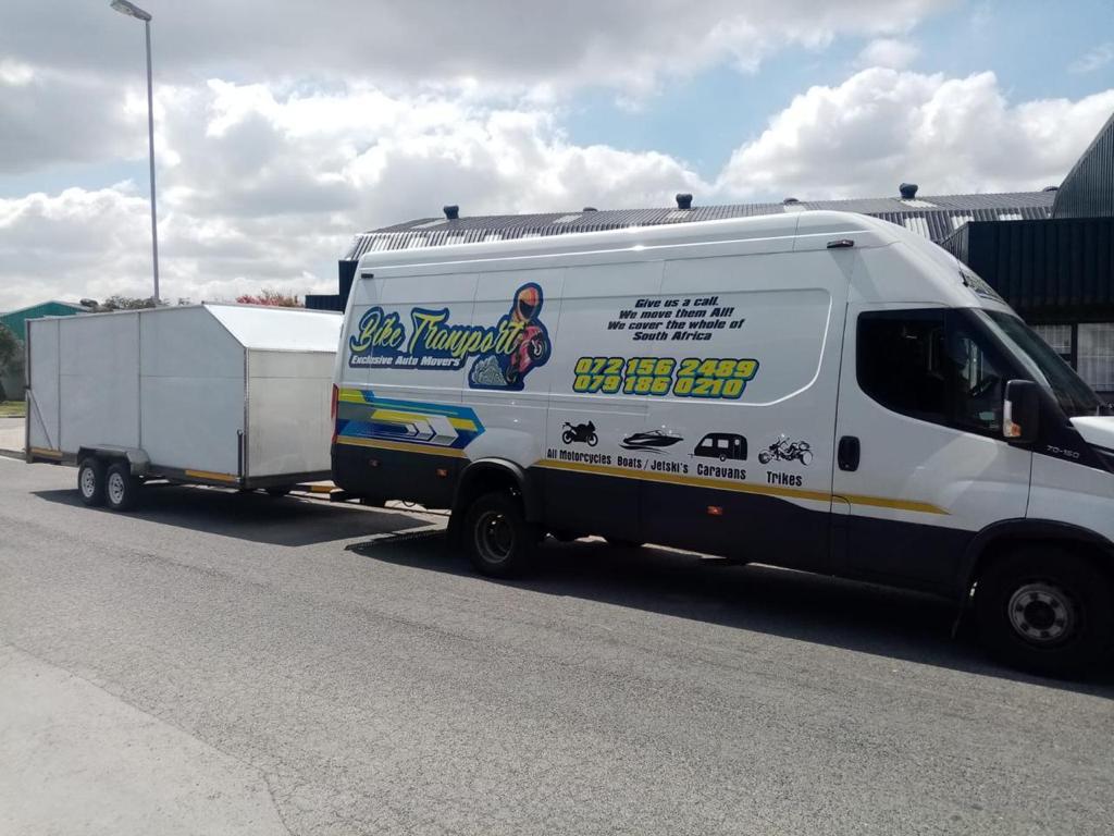 Bike secured on trailer for safe door-to-door delivery