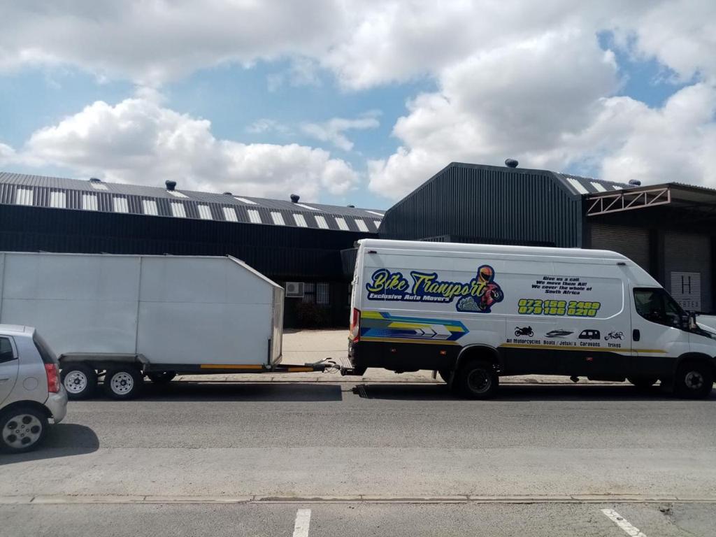 Motorcycle secured on carrier truck for nationwide transport